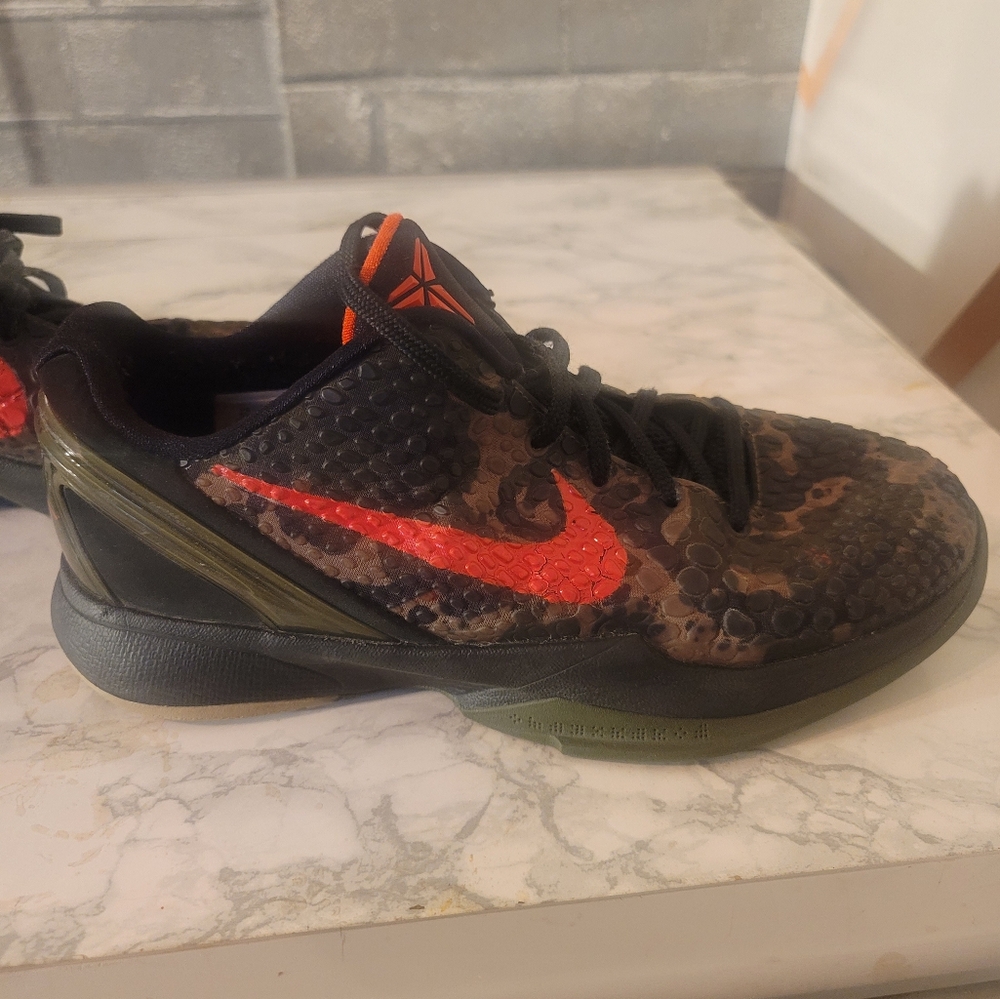 Nike Kobe Basketball Shoes with Red Swoosh